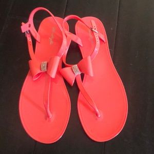 Pink jelly sandals.